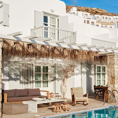 Sit out on the terrace and watch the sky change colour over the Aegean Sea