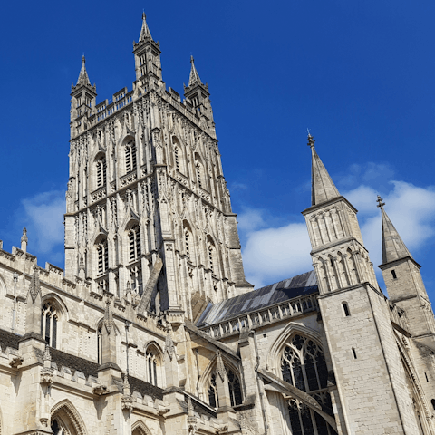 Travel into Gloucester to visit the cathedral
