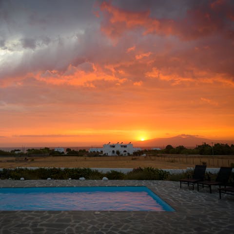 Watch spectacular sunsets from the poolside