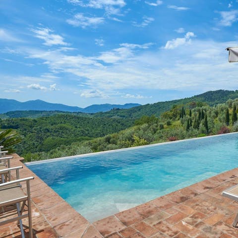 Swim in the private pool with far-reaching views