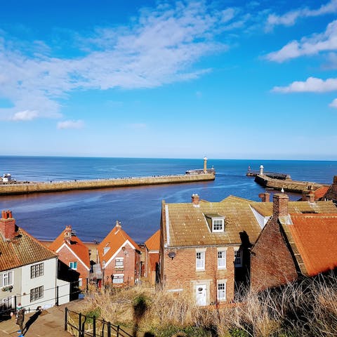 Stroll five minutes to Whitby's harbour and beach for fish and chips by the sea