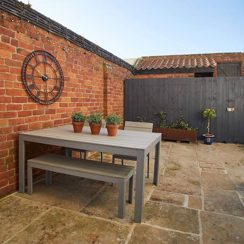 Make the most of the sun and sea breeze in the private courtyard garden