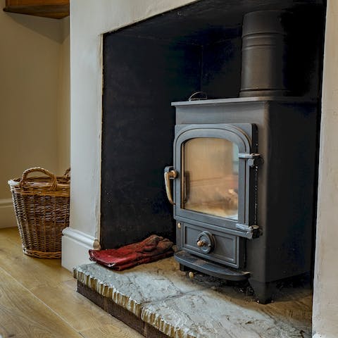 Curl up in front of the fireplace after a country walk in Shropshire