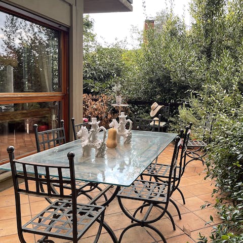 Serve up fresh bread and olives on the alfresco dining terrace