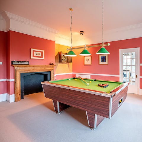 Keep yourselves entertained with a few games of pool in the games room