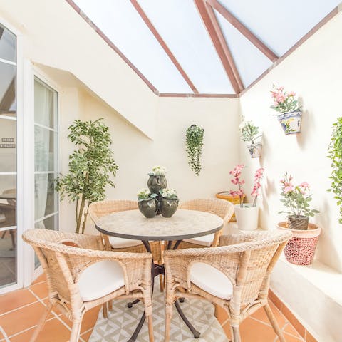 Lay the table for a lazy breakfast on the covered terrace