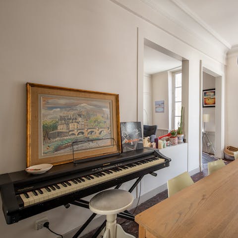Practice your arpeggios and scales on the keyboard in the dining room