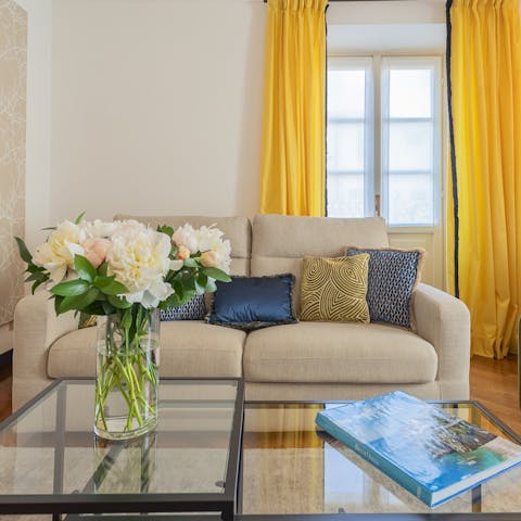 Have a rest after all that sightseeing in the living room with its sunflower yellow curtains