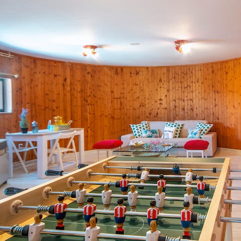 Get competitive with a game of ping pong or darts