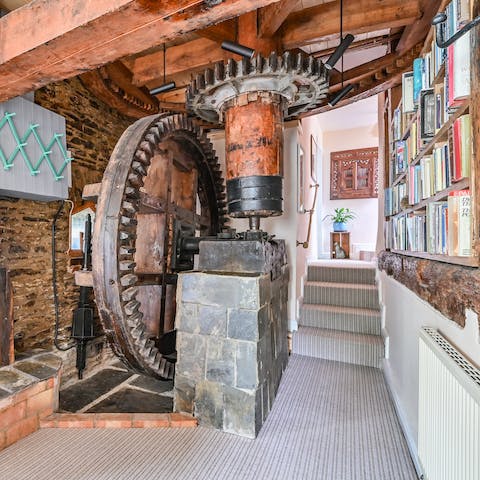 Marvel at the inner workings of the former corn mill – once the largest pitch back water wheels in Cornwall, no less