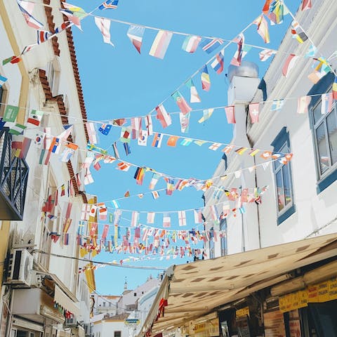 Explore the cobblestone streets of nearby Albufeira, approximately a ten-minute drive