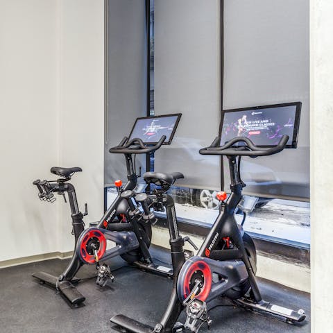 Get your endorphins flowing with a workout on the Peloton in the fitness centre next door