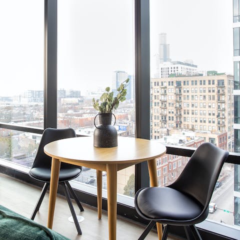Sip your morning coffee at the dining nook overlooking the bustling streets