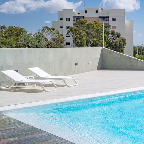 Soak up the sun from in or beside the communal pool