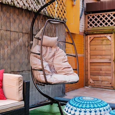 Swing in the egg chair outside and read a good book