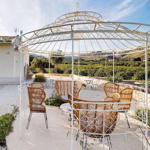 Take in the Sicilian countryside views from the terrace