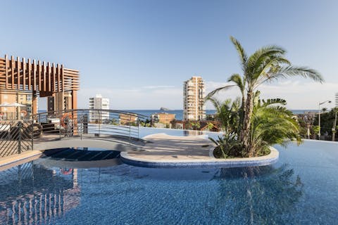 Have your morning swim in the communal pool while enjoying the views of the ocean
