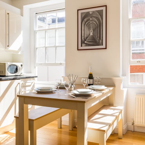 Sit down for dinner, bathed in light from the large sash windows