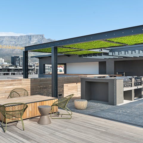Fire up the barbecue for supper on the communal rooftop terrace