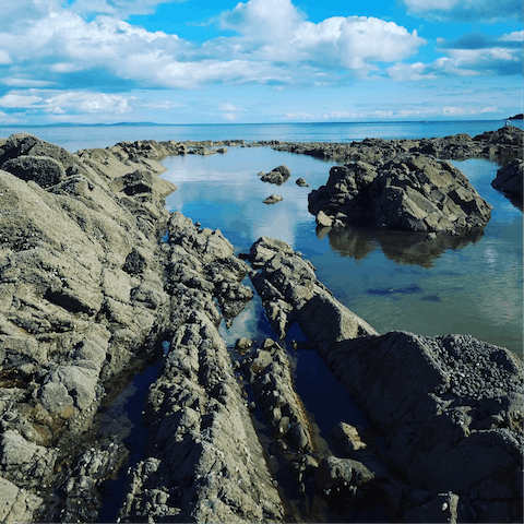 Admire the view at Saundersfoot Harbour,  within a six–minute walk away