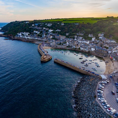 Visit Mousehole Harbour, where you might see seals playing in the water
