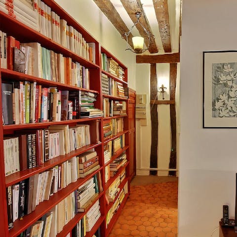 Browse the library for a book to read after a day of sightseeing
