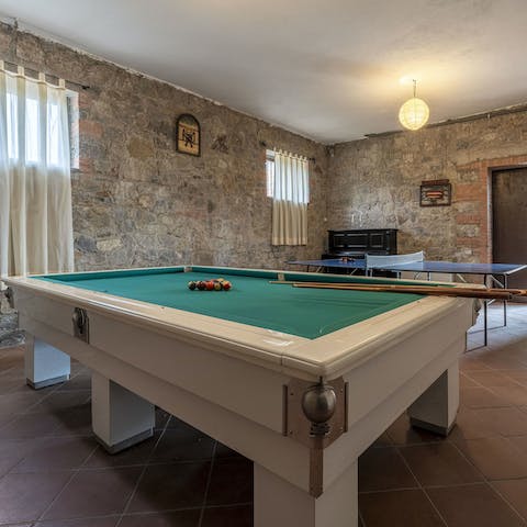 Play pool or table tennis in the games room