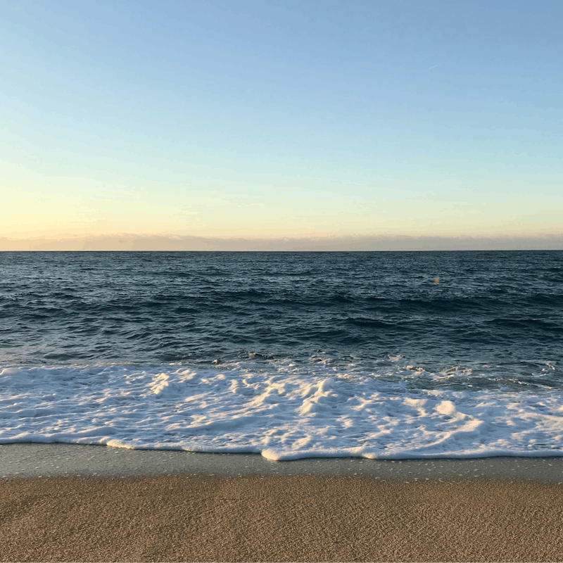 Watch the sunset at the quiet Santa Maria del Focallo beach just a short walk from your doorstep