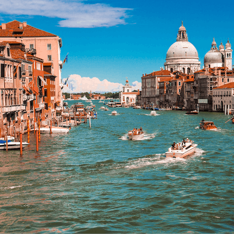 Float along the famous Grand Canal, just footsteps from your building