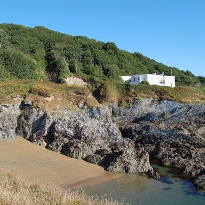 Go for a paddle at the stunning sandy beach, just in front of the house