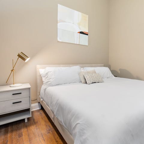 Slip into luxury sheets after a long day of exploring the city