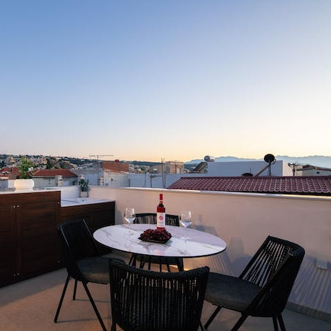 Set up for sundowners on the terrace overlooking the rooftops