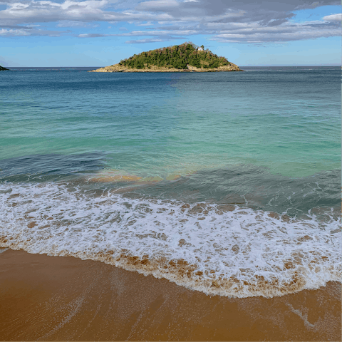 Top up your tan at La Concha Beach, a nine-minute walk away