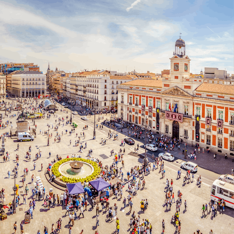 Stay just a twelve-minute walk away from Plaza Mayor