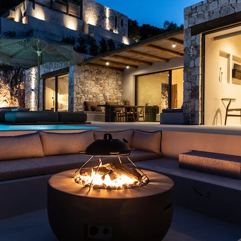 Spend balmy evenings curled up by the fire-pit