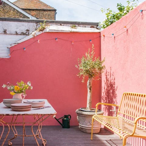Enjoy a glass of wine in your delightful courtyard, making the most of the late afternoon sun