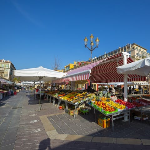 Pick up some local specialties at the Liberation market –⁠ a five-minute walk