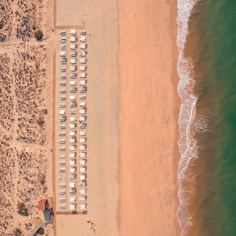 Look forward to breathing in the sea air on Marinha Beach