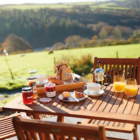 Take in the incredible views over the countryside with your breakfast