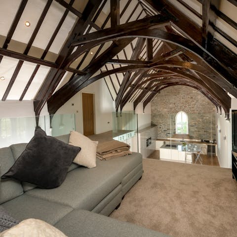 Cosy up in the snug raised living area while admiring the stunning architecture 
