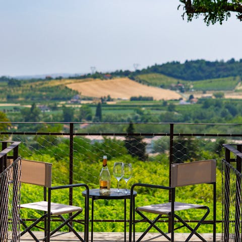 Pour yourself a glass of local wine and drink in the panoramic vistas from the terrace