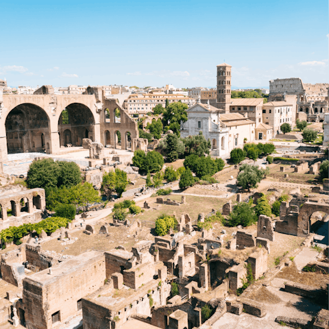 Walk in the footsteps of emperors at the Roman Forum, a ten-minute walk from this home