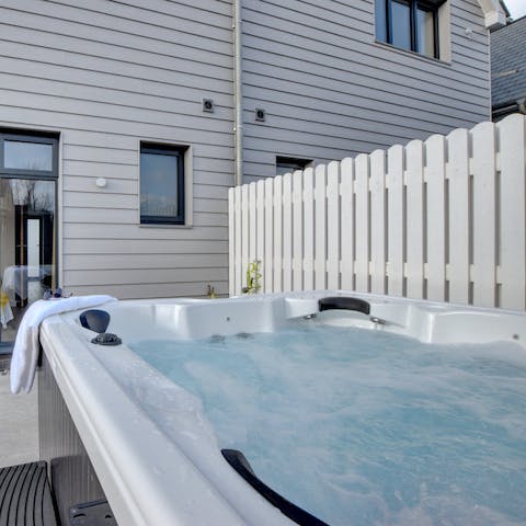 Soak in your private outdoor hot tub