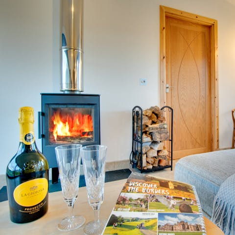 Sit by the log burner fireplace and get cosy on winter evenings