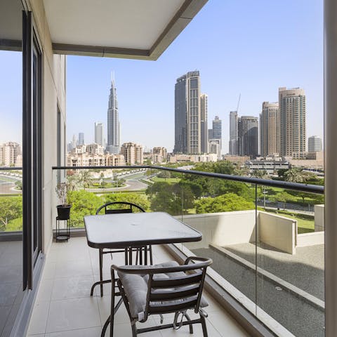 Soak up the city vistas from the bedroom's private balcony
