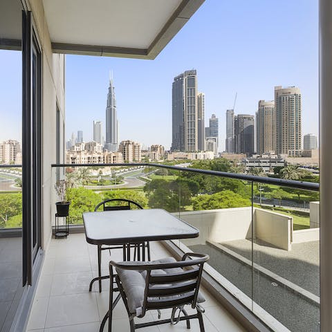 Soak up the city vistas from the bedroom's private balcony