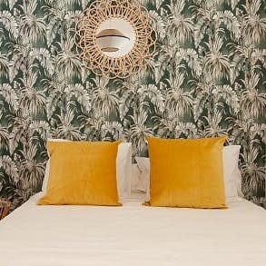 Wake up in the tropical-accented bedroom feeling rested and ready for another day of Madrid sightseeing