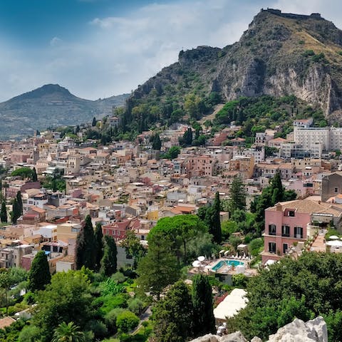 Explore Taormina, with its Greco-Roman theatre, 2 kilometres away