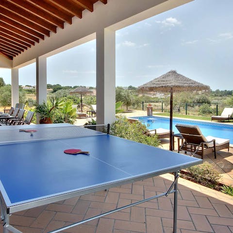 Enjoy a game of ping-pong on the shaded terrace
