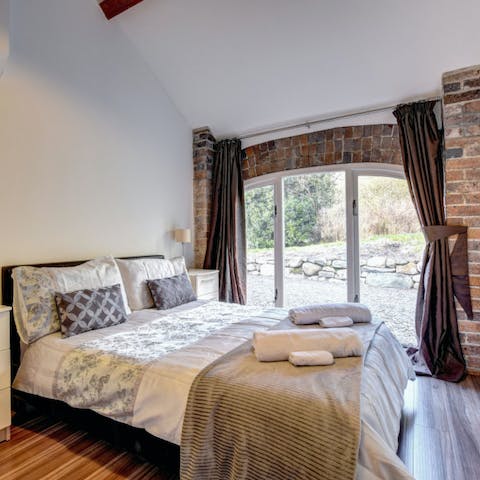 Wake up to countryside views from the comfy master bedroom